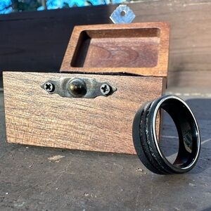 Thorum “The Meteorsaur” black wedding band